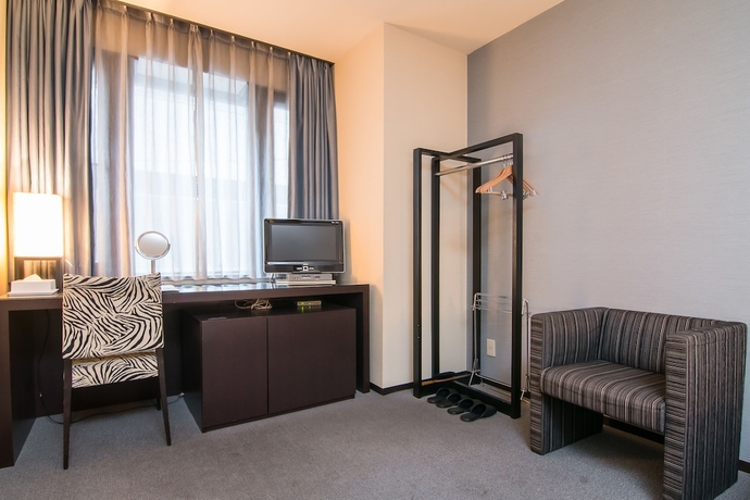 Imagen de la habitación del Hotel Strix Tokyo. Foto 4