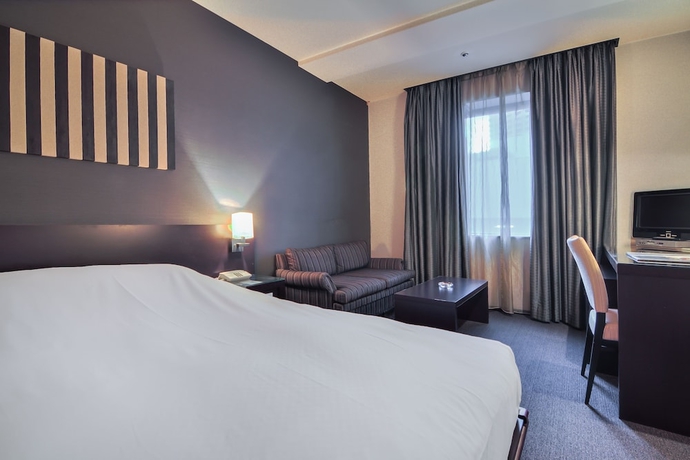 Imagen de la habitación del Hotel Strix Tokyo. Foto 7