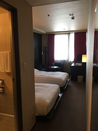 Imagen de la habitación del Hotel Strix Tokyo. Foto 10