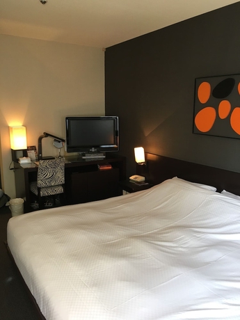 Imagen de la habitación del Hotel Strix Tokyo. Foto 13