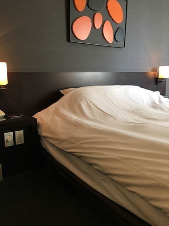 Imagen de la habitación del Hotel Strix Tokyo. Foto 14