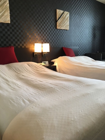 Imagen de la habitación del Hotel Strix Tokyo. Foto 15