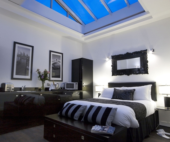 Imagen de la habitación del Hotel Strozzi Palace Suites By Mansley. Foto 4