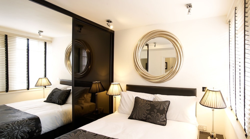 Imagen de la habitación del Hotel Strozzi Palace Suites By Mansley. Foto 17