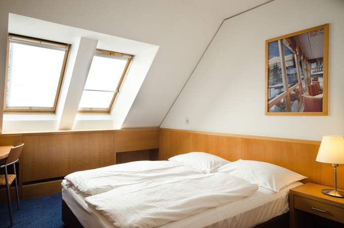 Imagen de la habitación del Hotel Strudlhof. Foto 12