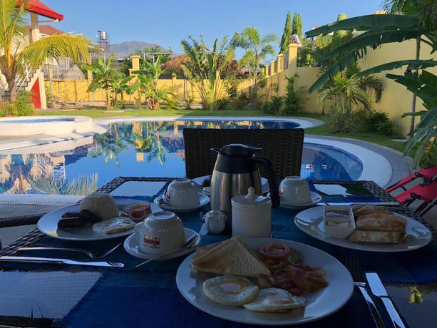 Imagen del bar/restaurante del Hotel Strutz Art Garden Resort. Foto 5