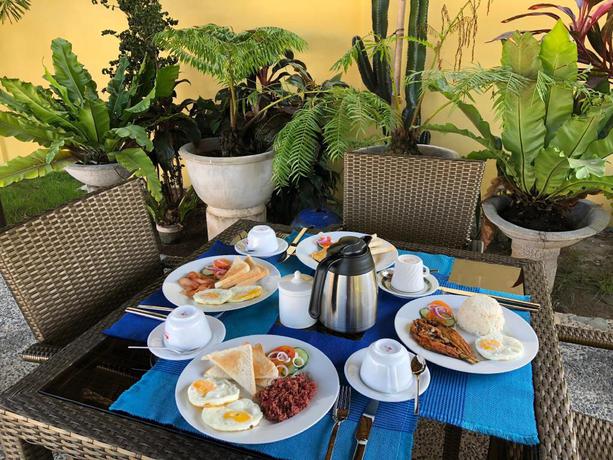 Imagen del bar/restaurante del Hotel Strutz Art Garden Resort. Foto 6