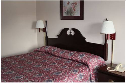 Imagen de la habitación del Hotel Studio 9 Inn and Suites. Foto 4