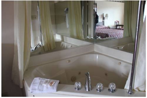 Imagen de la habitación del Hotel Studio 9 Inn and Suites. Foto 6