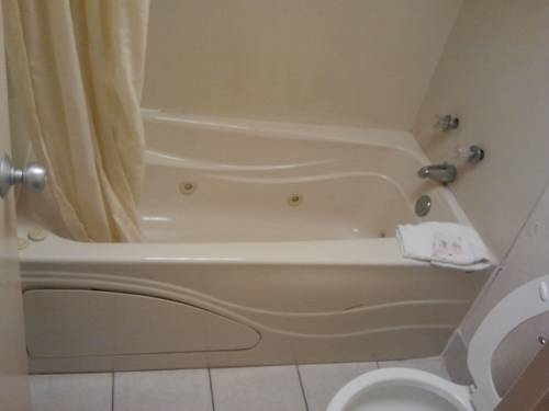 Imagen de la habitación del Hotel Studio 9 Inn and Suites. Foto 8