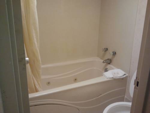 Imagen de la habitación del Hotel Studio 9 Inn and Suites. Foto 9