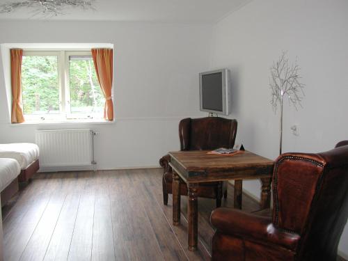 Imagen de la habitación del Hotel Studio Bosch Duin Strand. Foto 8