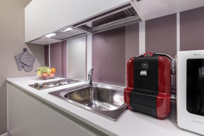 Imagen de la habitación del Hotel Studio Inn De Angeli. Foto 5