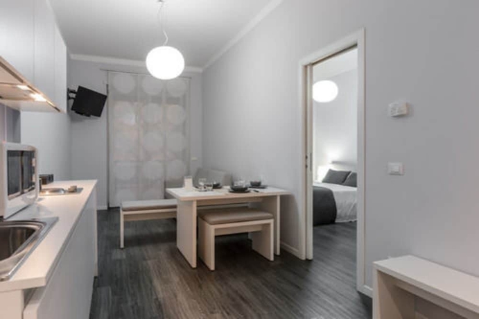 Imagen de la habitación del Hotel Studio Inn De Angeli. Foto 9