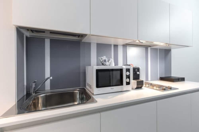 Imagen de la habitación del Hotel Studio Inn De Angeli. Foto 10