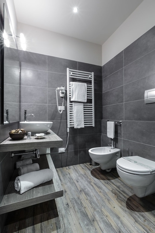 Imagen de la habitación del Hotel Studio Inn De Angeli. Foto 13