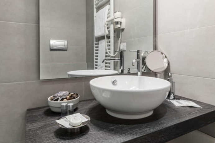 Imagen de la habitación del Hotel Studio Inn De Angeli. Foto 14