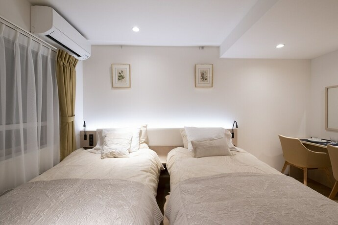 Imagen de la habitación del Hotel Studio Inn Nishishinjuku. Foto 23