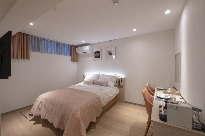 Imagen de la habitación del Hotel Studio Inn Nishishinjuku. Foto 31