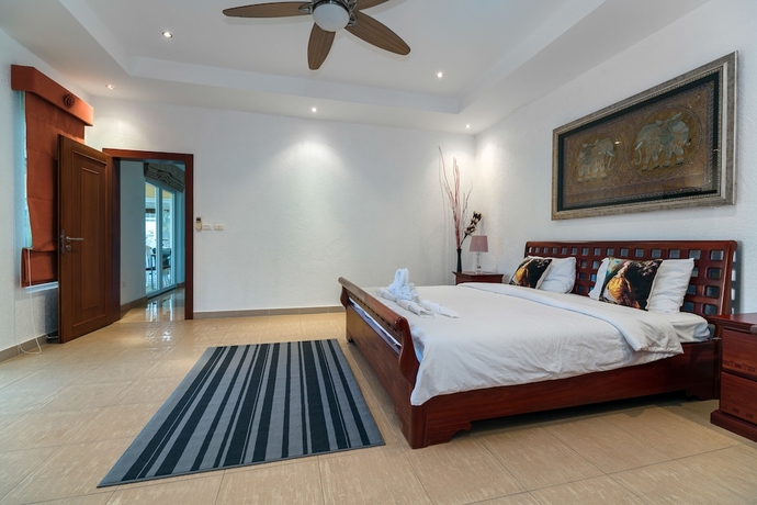 Imagen de la habitación del Hotel Stunning Luxury Golf and Pool Villas. Foto 2