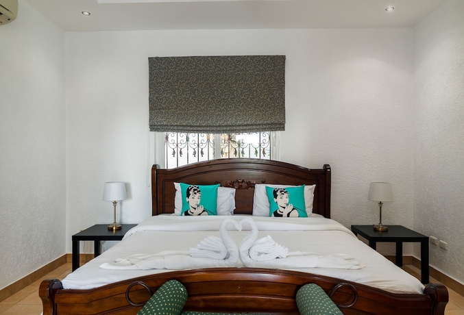 Imagen de la habitación del Hotel Stunning Luxury Golf and Pool Villas. Foto 3