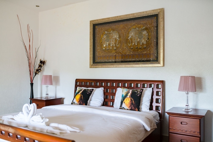 Imagen de la habitación del Hotel Stunning Luxury Golf and Pool Villas. Foto 5