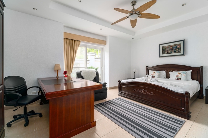 Imagen de la habitación del Hotel Stunning Luxury Golf and Pool Villas. Foto 10