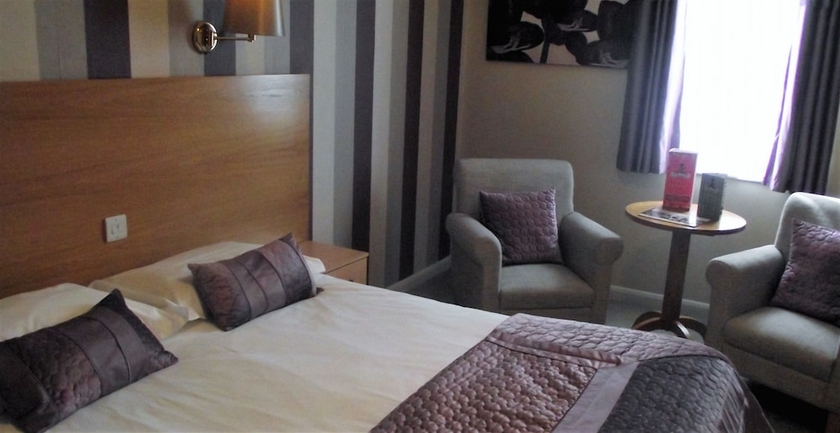 Imagen de la habitación del Hotel Sturdy's Castle Country Inn. Foto 11