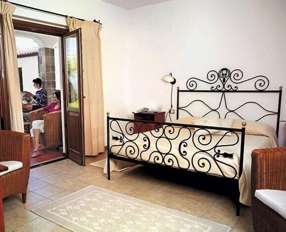 Imagen de la habitación del Hotel Su Baione. Foto 8