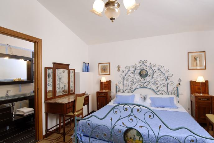 Imagen de la habitación del Hotel Su Barchile. Foto 12