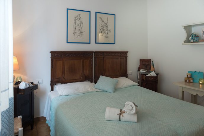 Imagen de la habitación del Hotel Su Barchile. Foto 15
