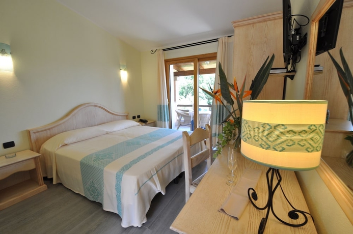 Imagen de la habitación del Hotel Su Giganti. Foto 8