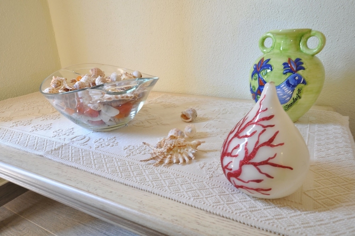 Imagen de la habitación del Hotel Su Giganti. Foto 11