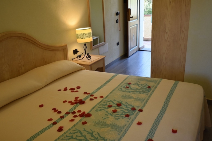 Imagen de la habitación del Hotel Su Giganti. Foto 14