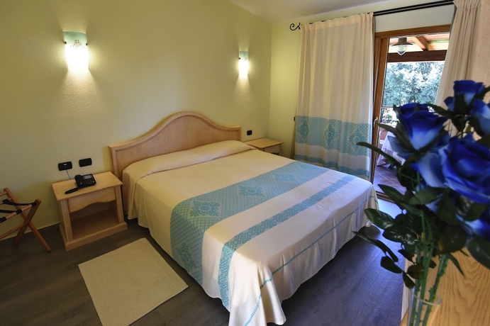 Imagen de la habitación del Hotel Su Giganti. Foto 15