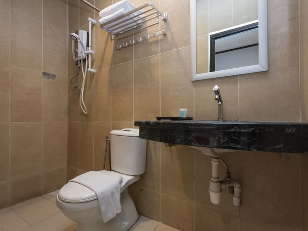 Imagen de la habitación del Hotel Suan Bee. Foto 14