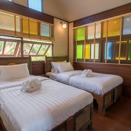 Imagen de la habitación del Hotel Suankaew Art Cottage. Foto 10