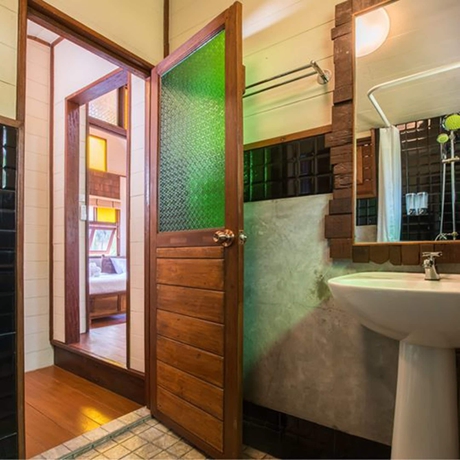 Imagen de la habitación del Hotel Suankaew Art Cottage. Foto 12