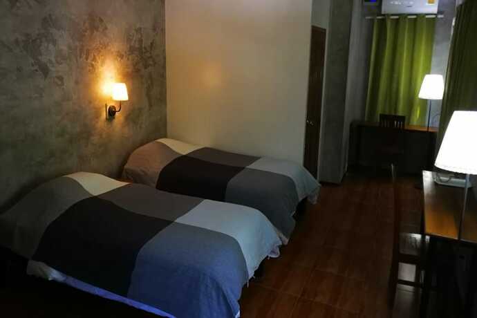 Imagen de la habitación del Hotel Suansaimai Resort. Foto 18