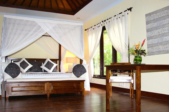 Imagen de la habitación del Hotel Suara Air Luxury Villa Ubud. Foto 5