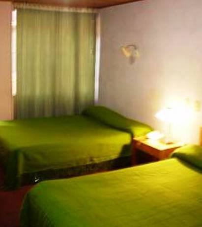 Imagen de la habitación del Hotel Suarel Center. Foto 2