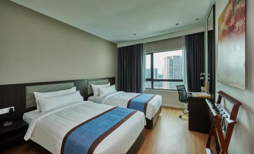Imagen de la habitación del Hotel Suasana All Suites. Foto 8