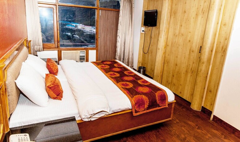 Imagen de la habitación del Hotel Subash International. Foto 15