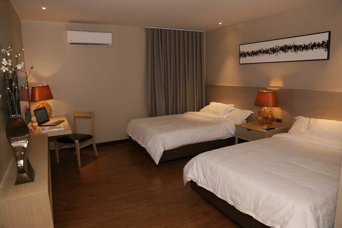 Imagen de la habitación del Hotel Subic Bay Travelers and Event Center. Foto 21