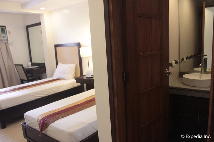 Imagen de la habitación del Hotel Subic Grand Seas Resort. Foto 8