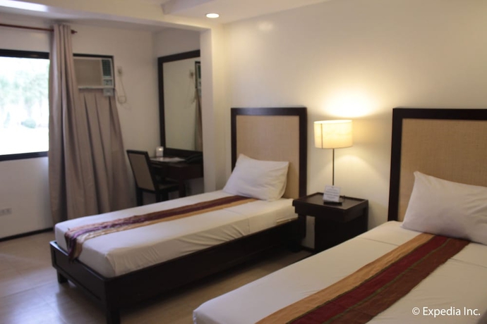 Imagen de la habitación del Hotel Subic Grand Seas Resort. Foto 9