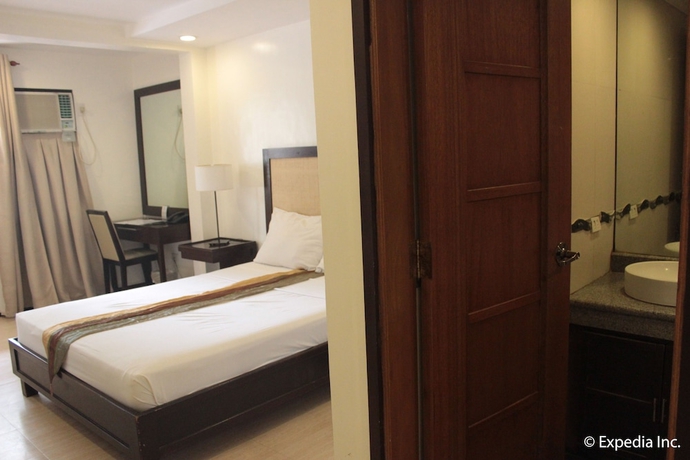 Imagen de la habitación del Hotel Subic Grand Seas Resort. Foto 10