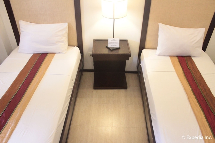Imagen de la habitación del Hotel Subic Grand Seas Resort. Foto 11