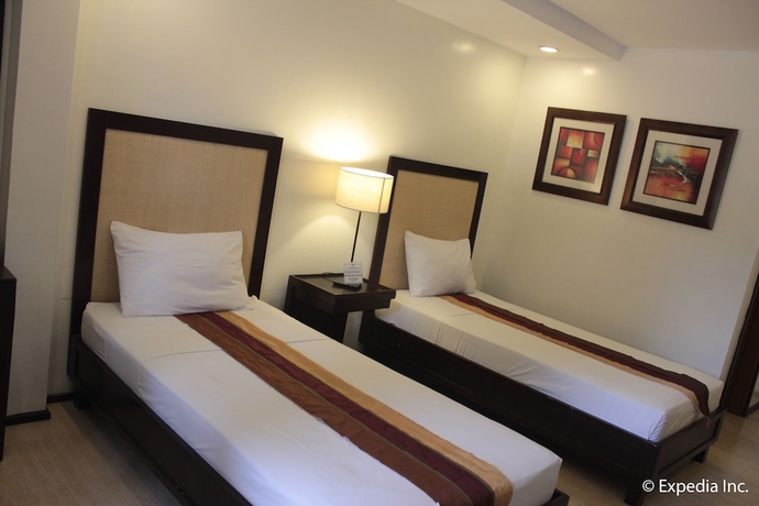 Imagen de la habitación del Hotel Subic Grand Seas Resort. Foto 12