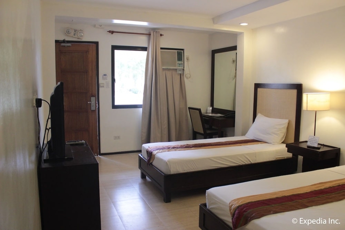 Imagen de la habitación del Hotel Subic Grand Seas Resort. Foto 13
